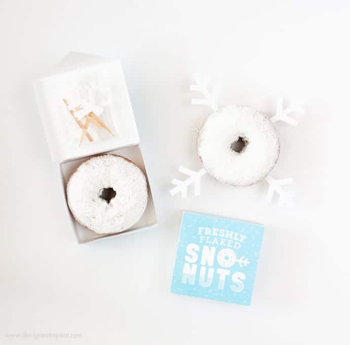 Freshly Baked Donuts? Pssh, how about Freshly Flaked Sno-Nuts! Download this free printable donut box kit from Design Eat Repeat for a fun addition to your holiday or Frozen party! Love it!