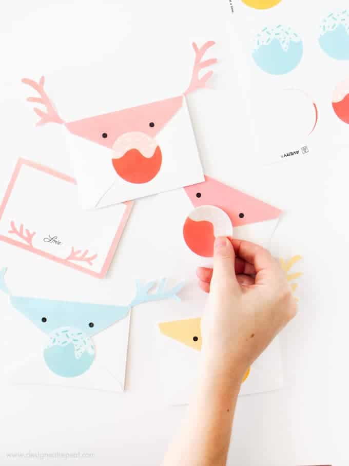 These reindeer envelopes are so adorable and easy to make with the printables from Design Eat Repeat! The entire set is free and comes with the envelope, notecard, and sticker nose template! Such a fun idea for kids!