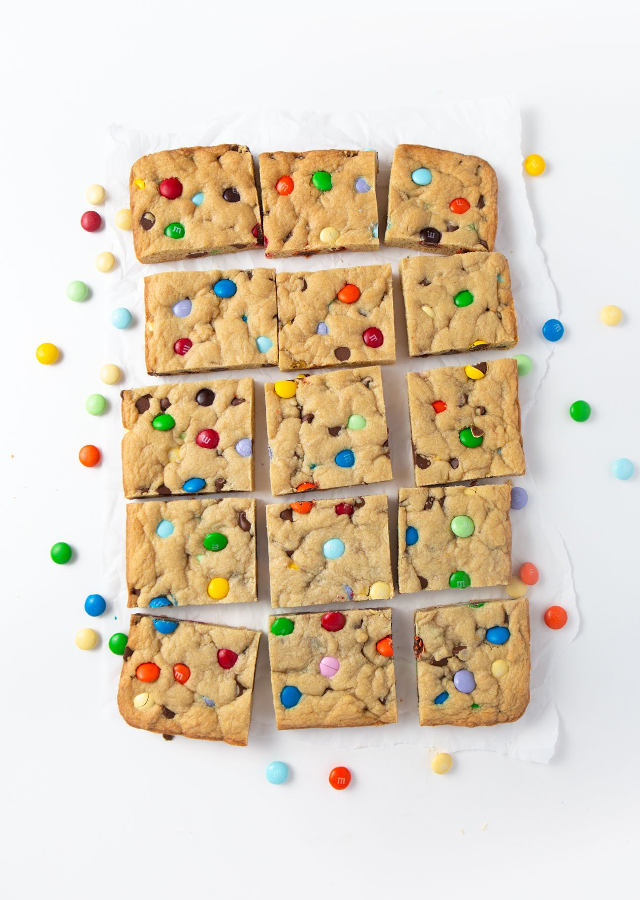 Chewy M&M Cookie bars cut into squares