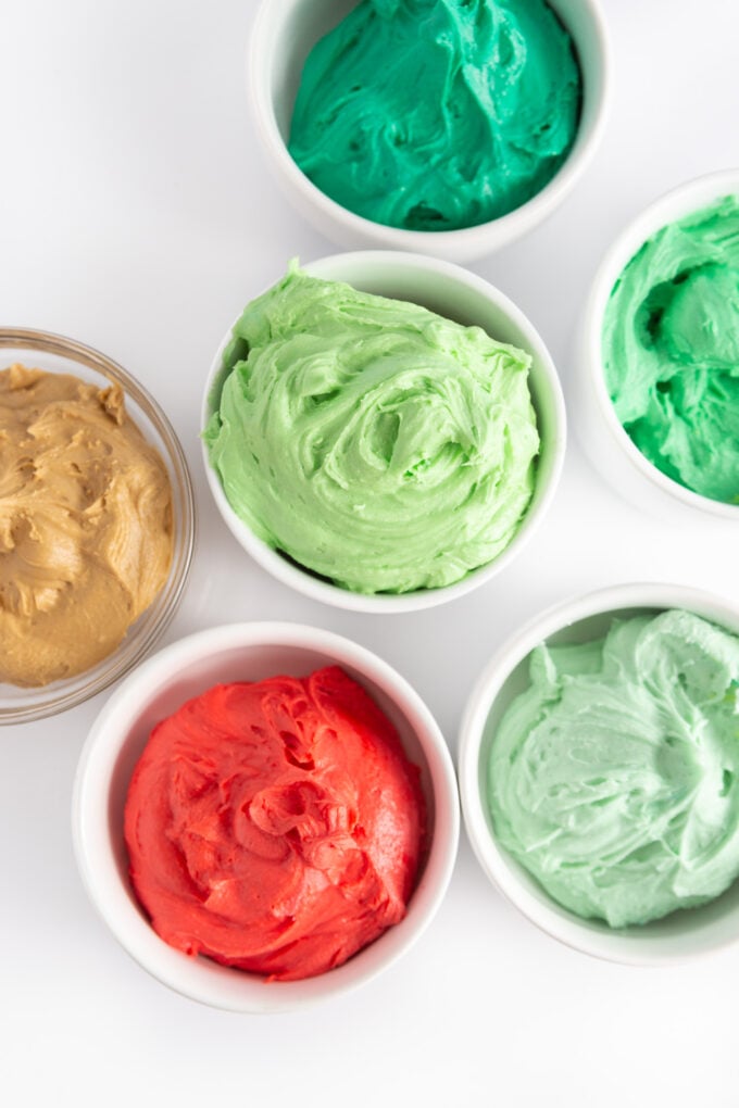 Bowls of christmas colored frosting