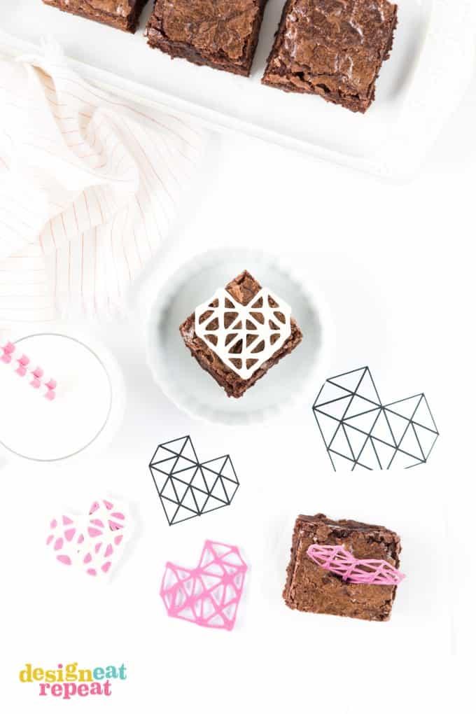 Dress up your Valentine's Day treats with these DIY Geometric Chocolate Heart Toppers! Includes the template download so you can easily trace!