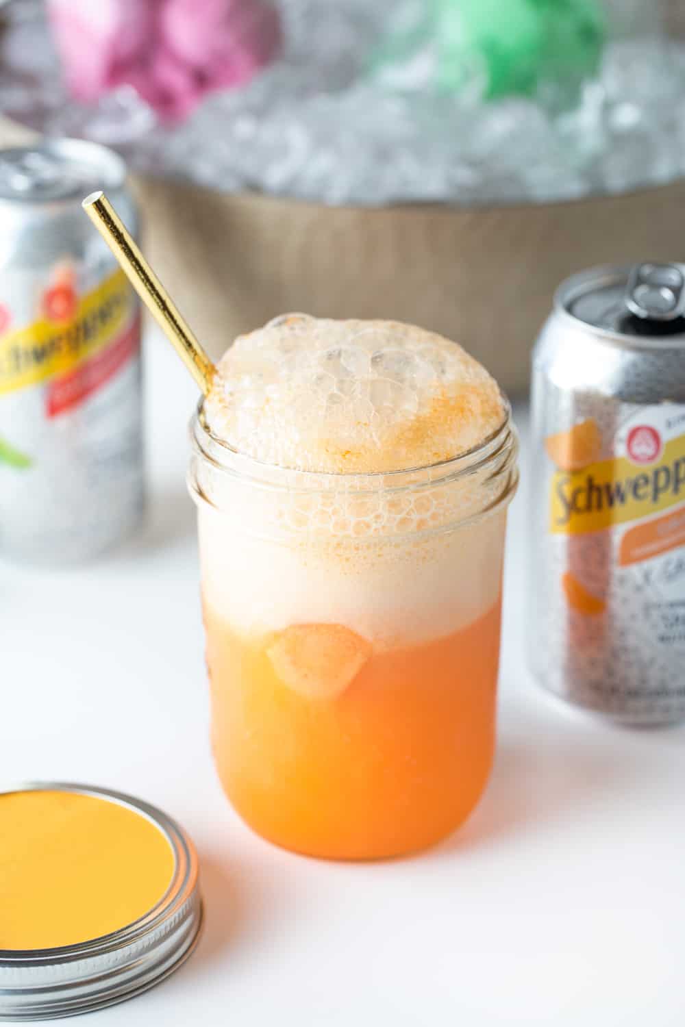 Carbonated Fizzing Orange Sherbet Punch in Glass with Orange Slice for Ultimate DIY Punch Bar