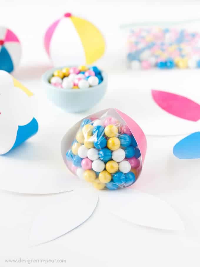 Download this free Beach Ball template to make an easy DIY Party Favor! Fill with candy, tape shut, and you're done!