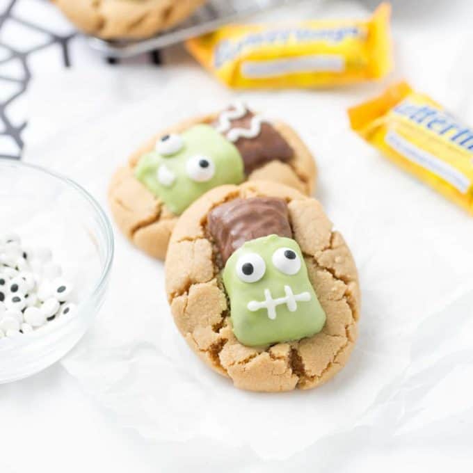 Peanut butter cookies with butterfinger decorated like frankenstein
