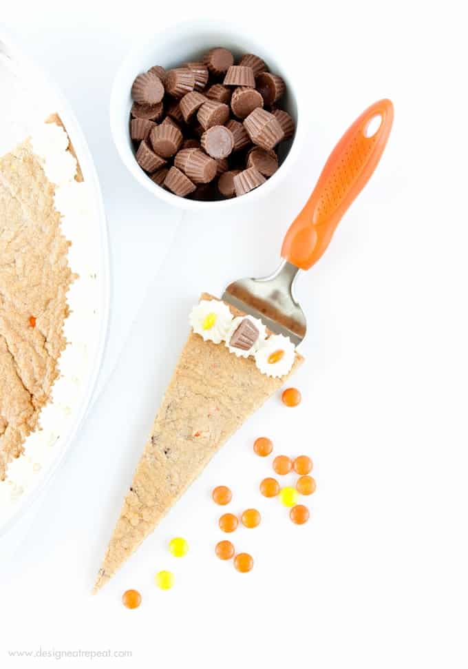 Forget the store bought! This Reeses Peanut Butter Cookie Cake by @designeatrepeat is easy to whip up and just as tasty as its premade competition!