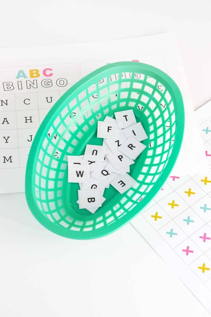 Green basket of alphabet bingo caller squares
