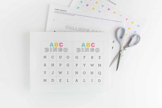 Materials to make alphabet bingo cards. Includes printables and scissors