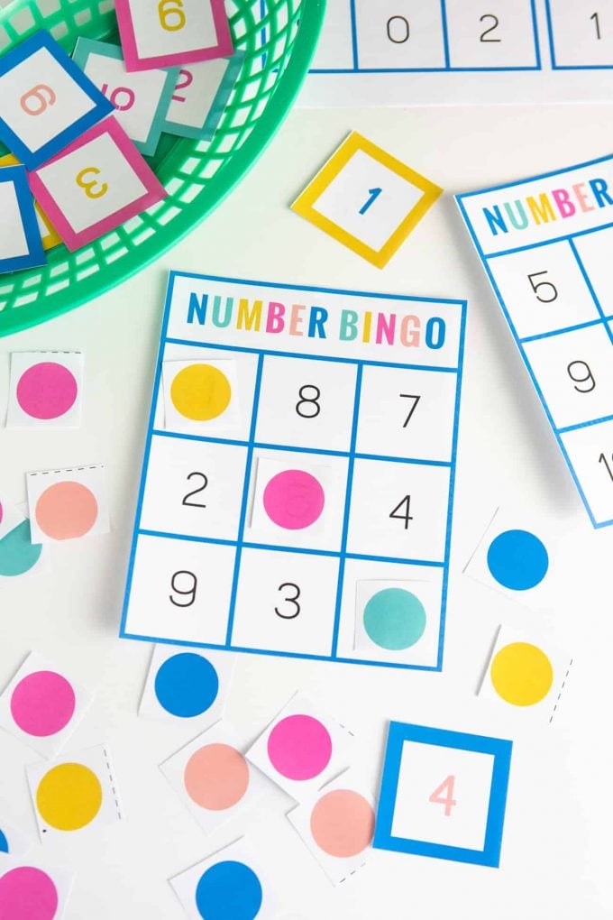 Number bingo cards with basket of numbers