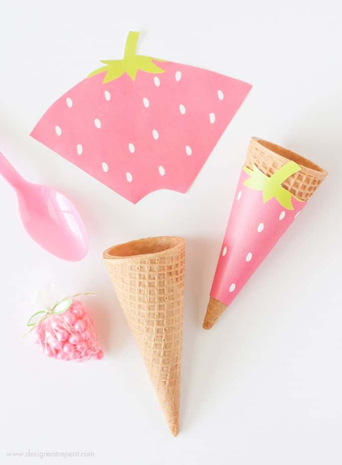 Free Printable Strawberry Icecream Cone Wrappers. Perfect addition to any summer or fruit-themed party!