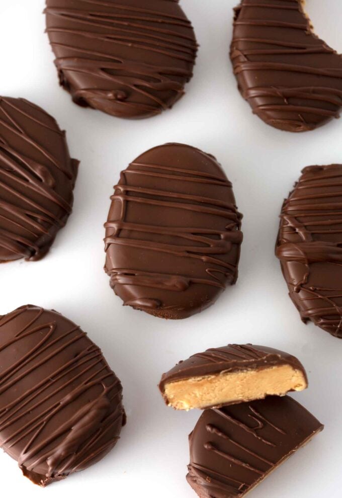 homemade peanut butter eggs dipped in chocolate with drizzle