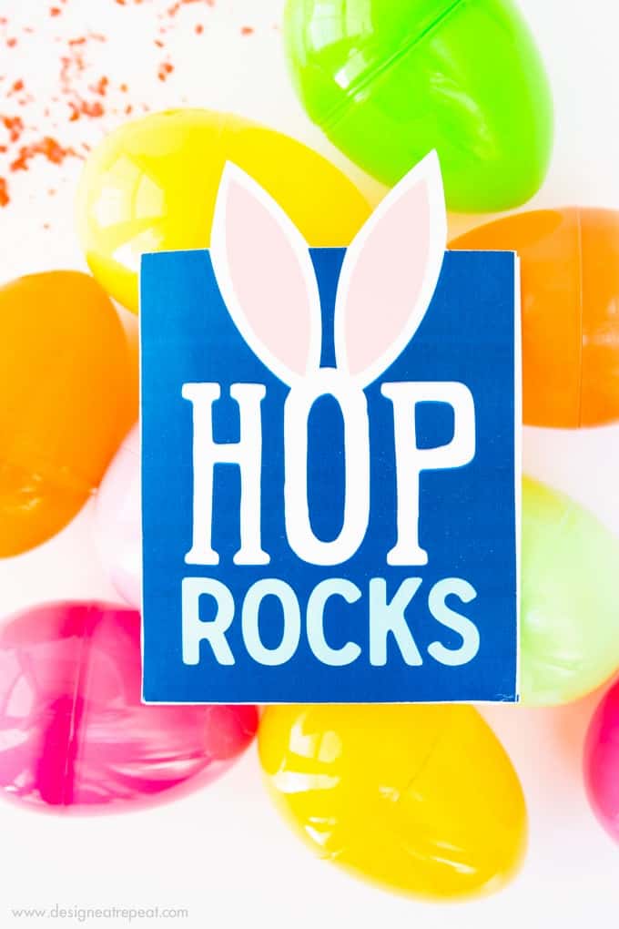 Need a fun way to spruce up your kid's Easter basket? Print off these Free Easter Printable "Hop Rock" Pouches and add in a packet of pop rocks for a fun surprise!