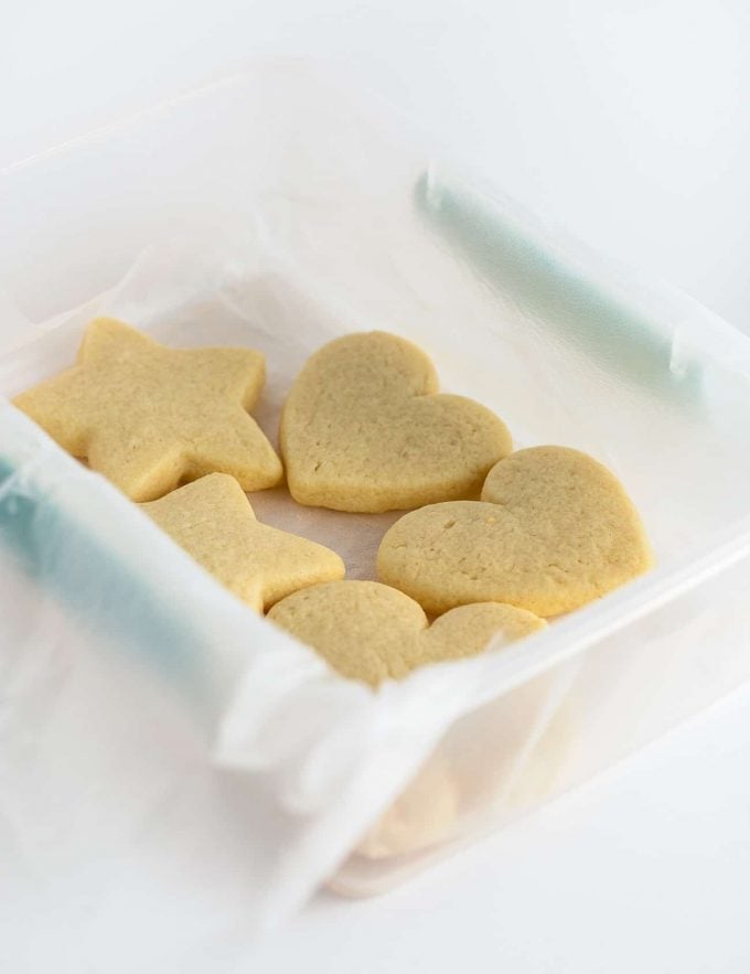 Container of shaped baked sugar cookies