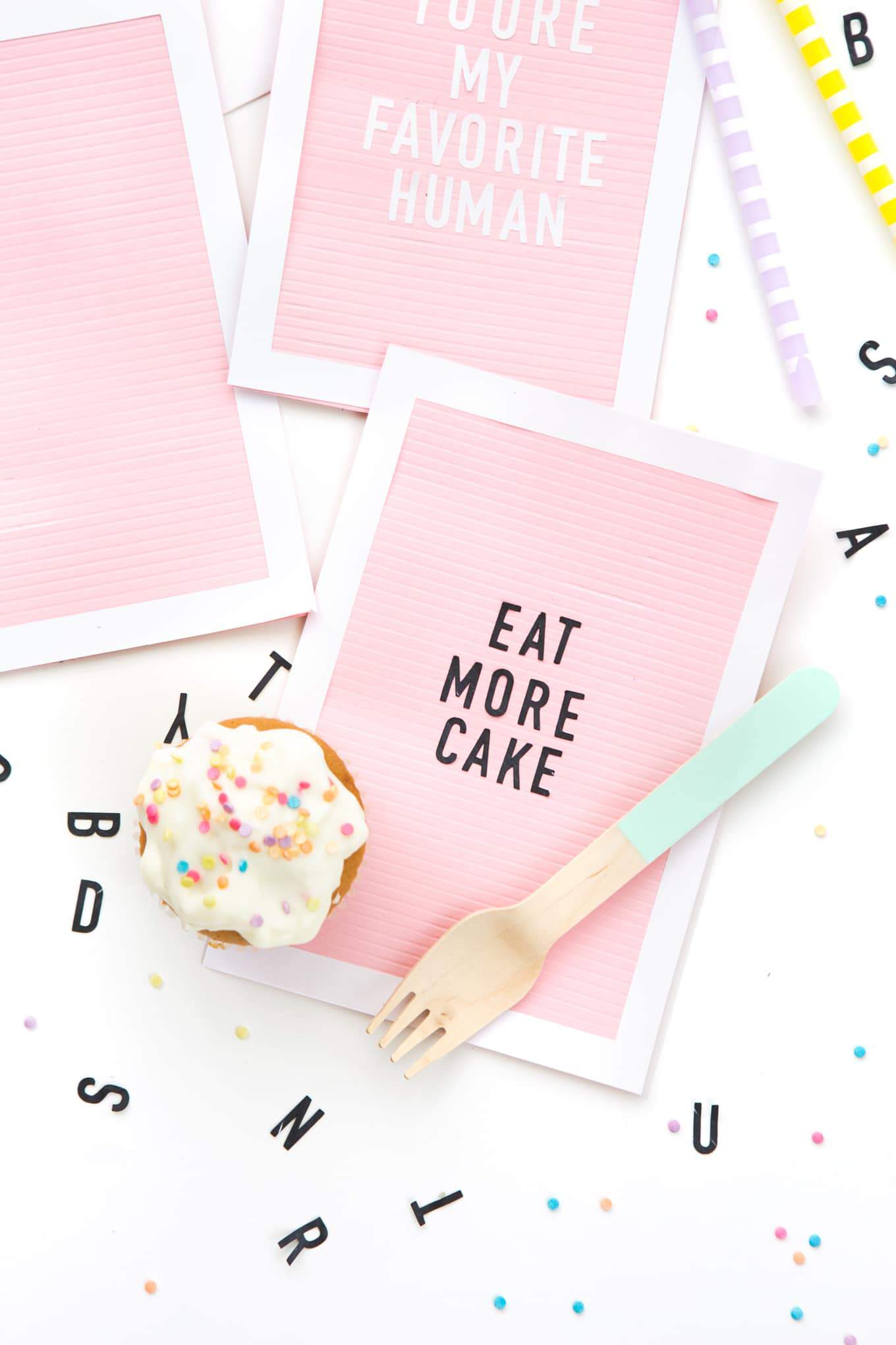 Pink letterboard DIY birthday card that says Eat More Cake 