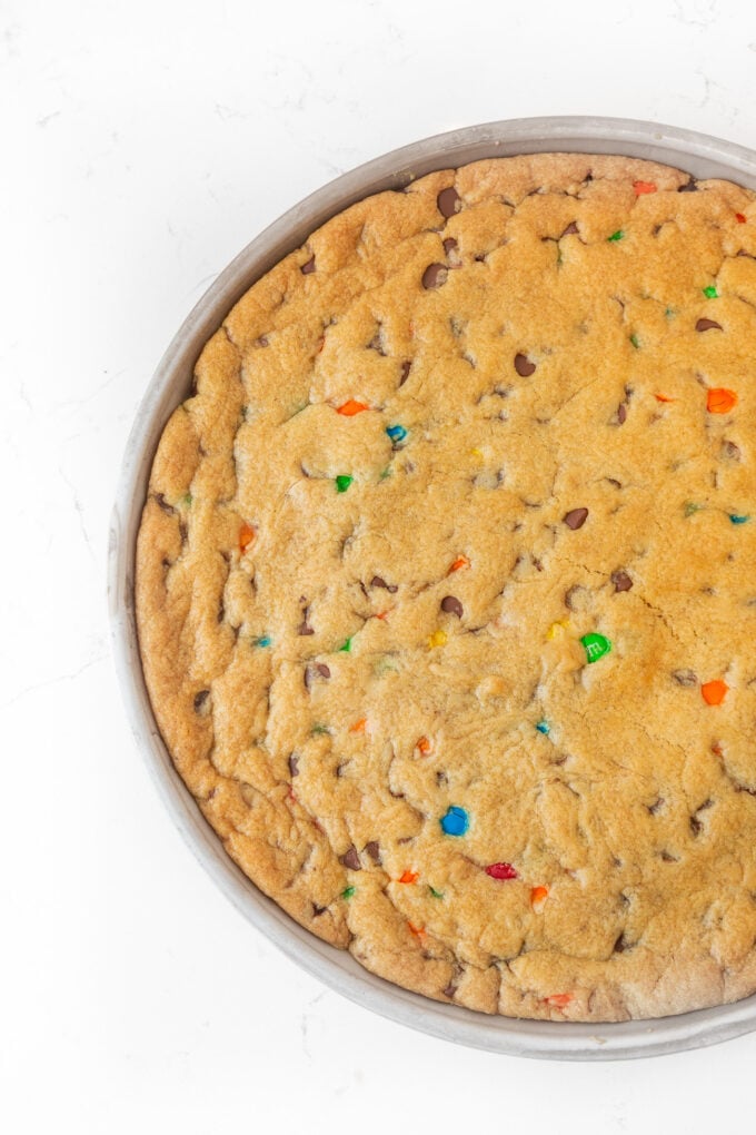 Baked M&M cookie cake in round pan