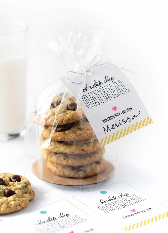 Plastic bag of chocolate chip oatmeal cookies with printable cookie gift tag