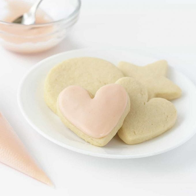 plate of sugar cookies with pink heart