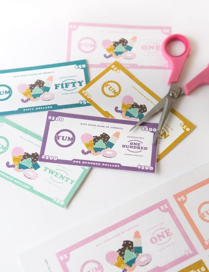 Assortment of colorful printable dessert-themed play money 