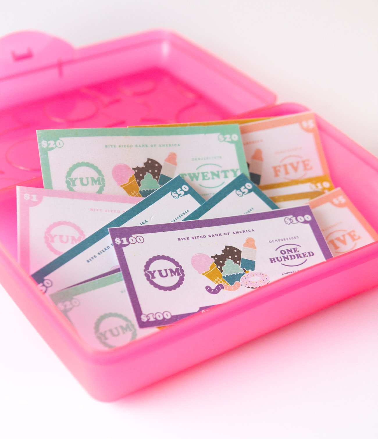 Storage for dessert themed free printable play money for kids, $1, $5, $10, $20, $50, $100