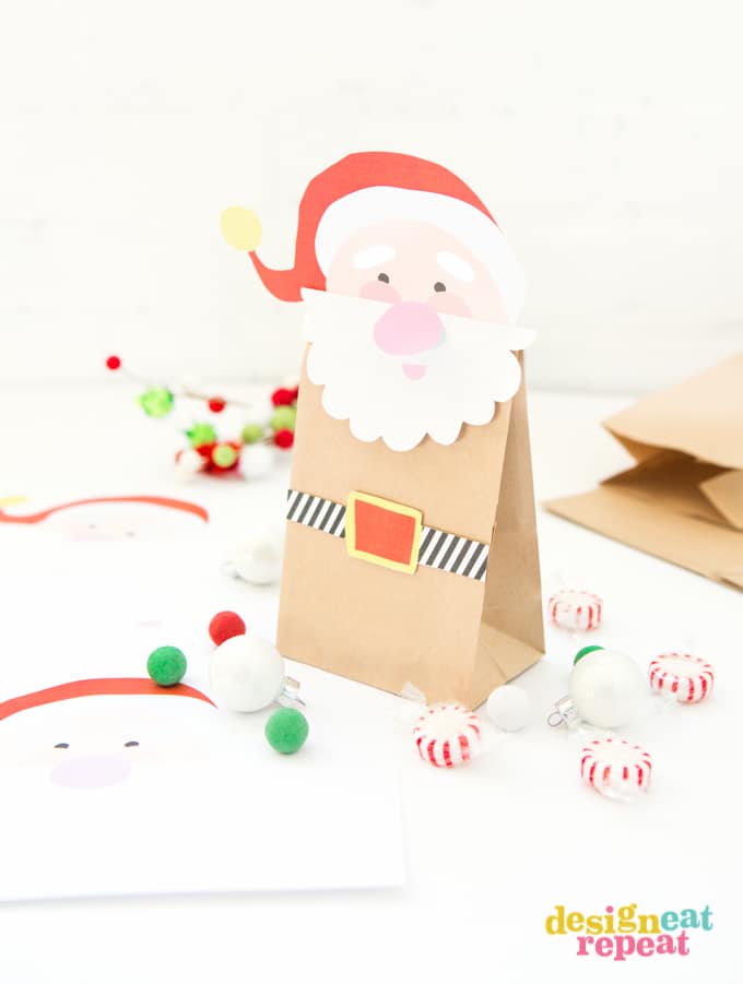 Looking for a new way to gift all those homemade candies and cookies this Christmas? These Free Printable Santa Treat Bags will surely do the trick! 