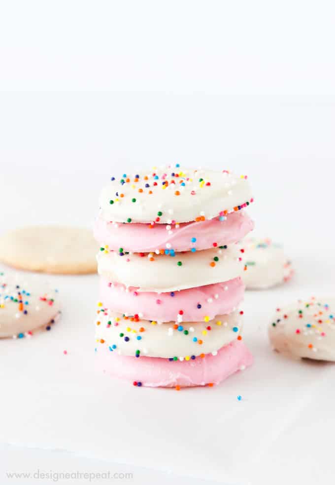 Recreate a childhood favorite with these Frosted Animal Cookie Wafers! Uses a sugar cookie base & almond bark for dipping!
