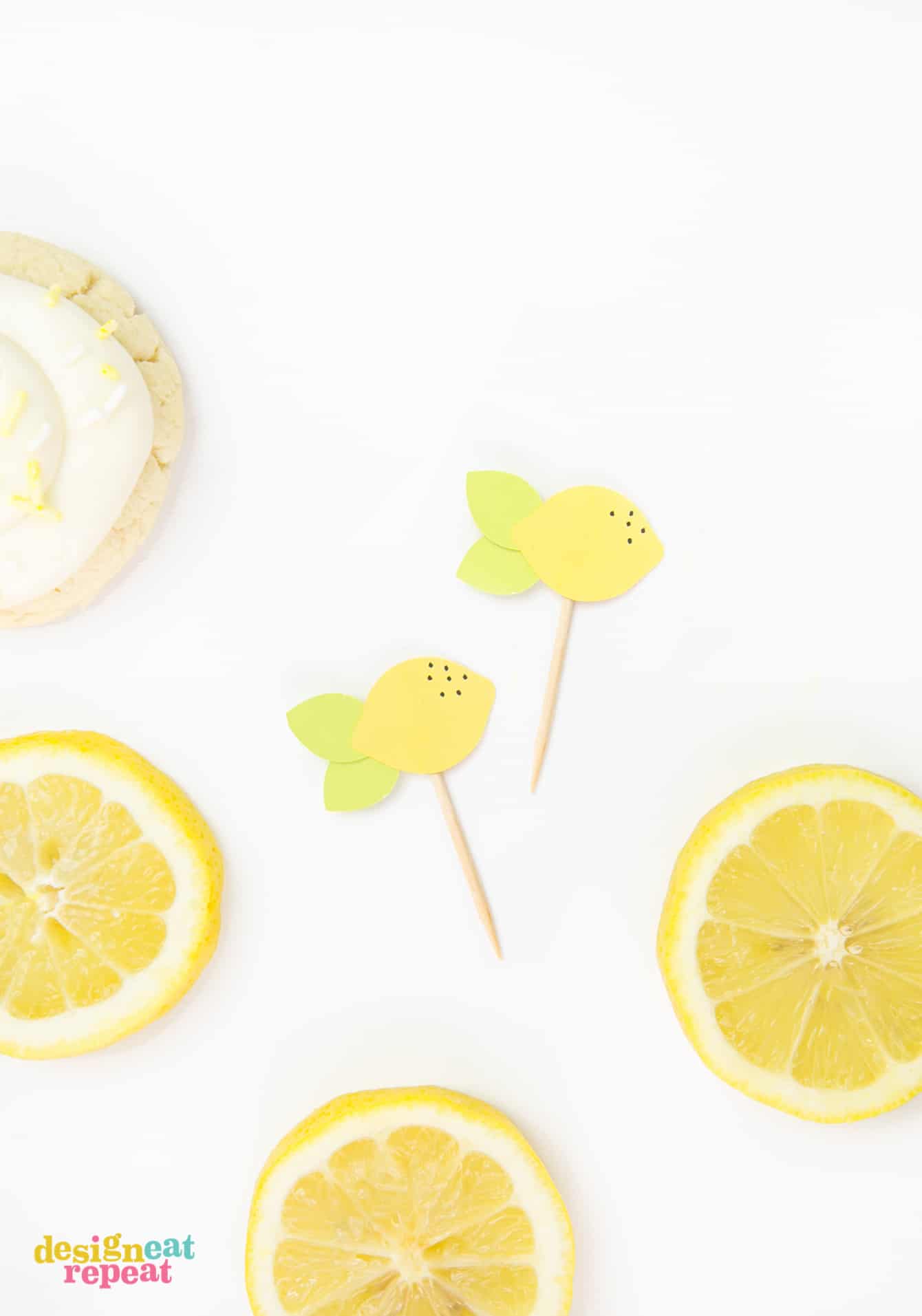 Lemon toppers on toothpicks to decorate thick lemon sugar cookies.
