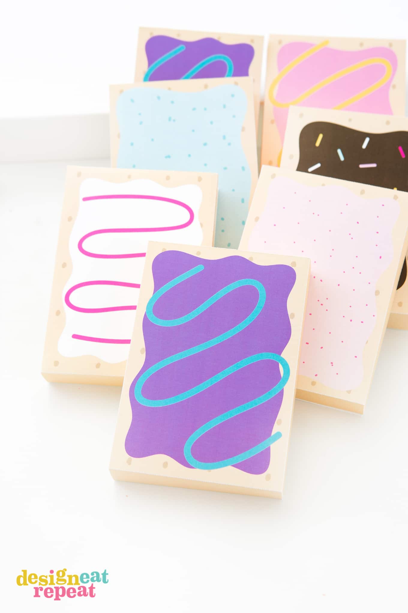 How fun are these?! Printable POP-TART treat boxes! With 8 delectable designs, these gift box templates are sure to please your party goers with their flavor of choice! Download at DesignEatRepeat.com | #printable #silhouette