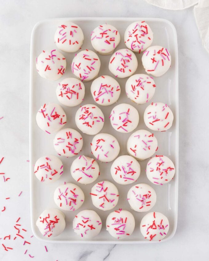 tray of sugar cookie Valentine truffles with red and pink sprinkles