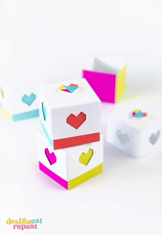 Package your Valentine's Day candy in these colorful (mini!) printable heart boxes for a unique spin on the traditional red heart box!