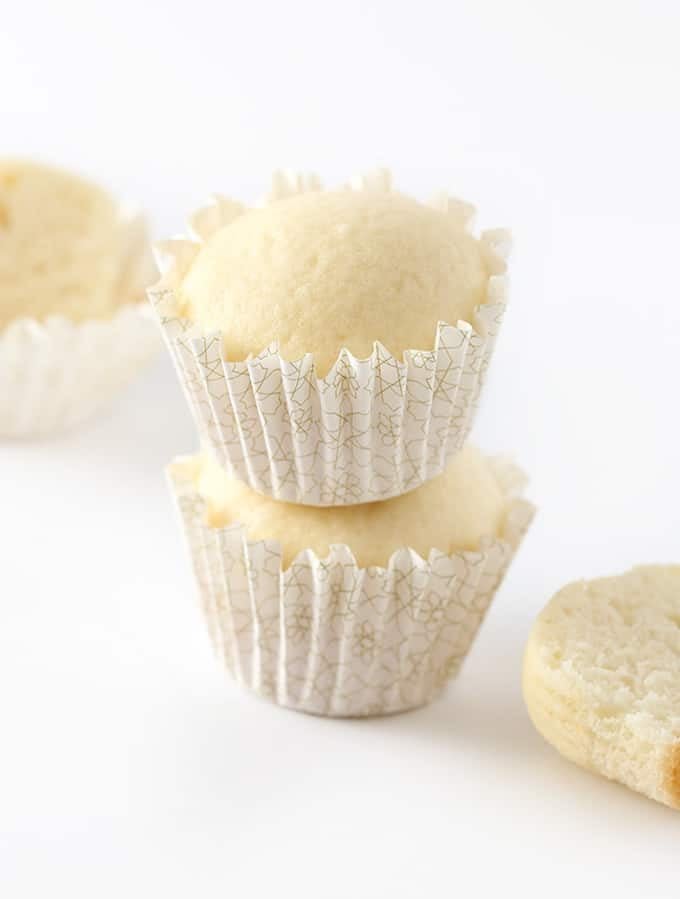 These white wedding cupcakes turn a boxed cake mix into the most amazing vanilla cupcakes you've ever had.